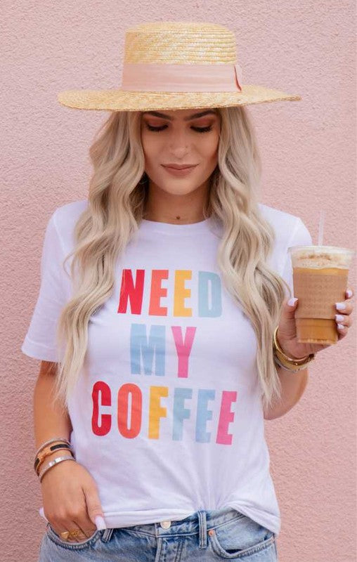 A stylish NEED MY COFFEE Crewneck Tee made from soft cotton, featuring a bold graphic design perfect for coffee lovers.