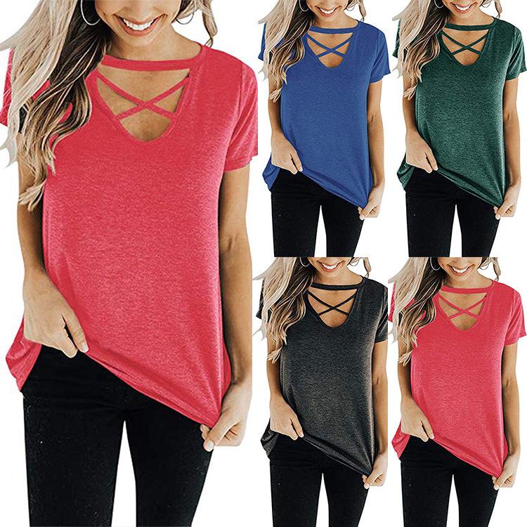 A stylish women's top featuring a front chest cross design, V-neckline, and short sleeves, made from soft cotton material in a solid color.