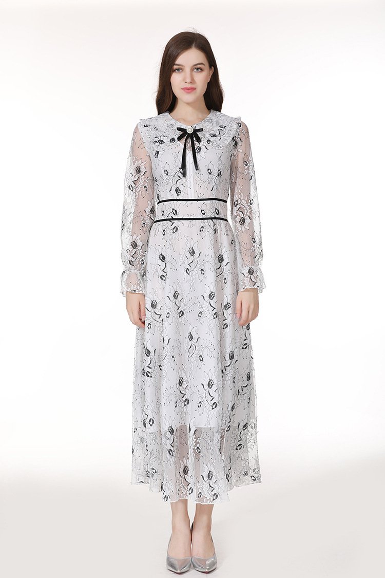 A stylish long sleeve dress featuring a beautiful flower bud print, perfect for elegant occasions.