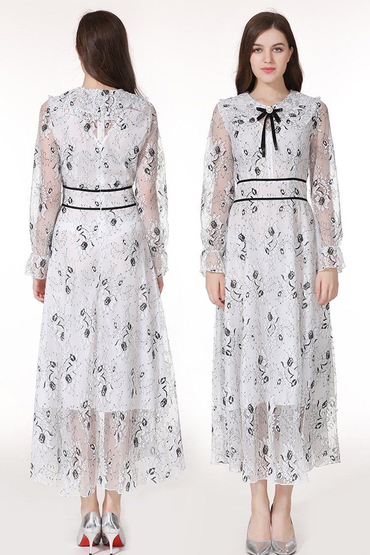 A stylish long sleeve dress featuring a beautiful flower bud print, perfect for elegant occasions.