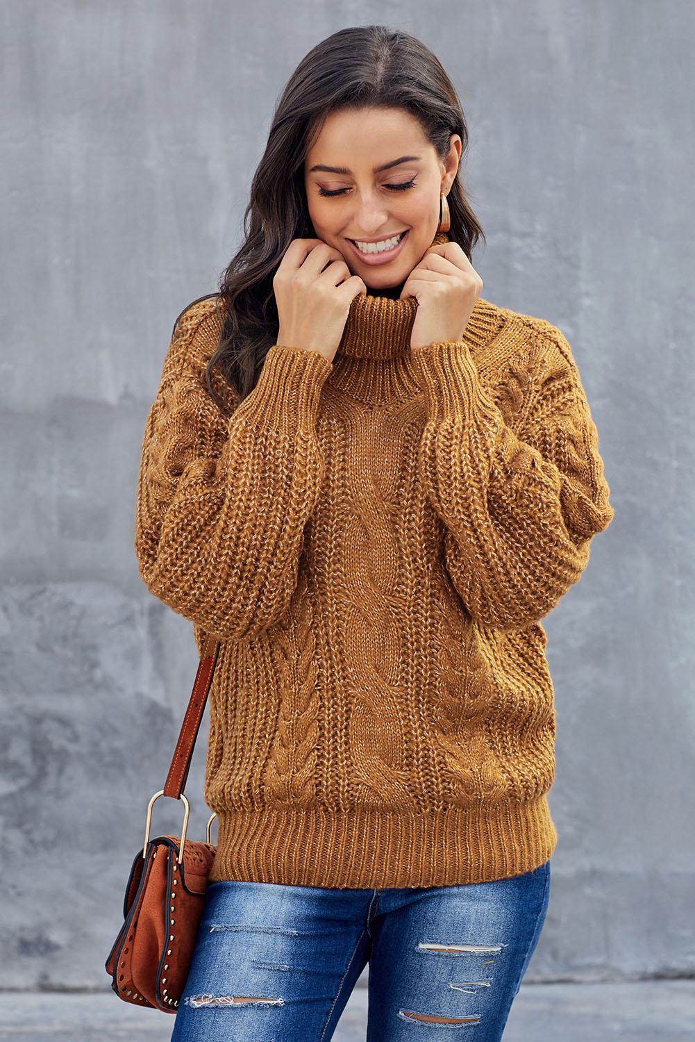 A vibrant yellow chunky turtleneck winter sweater with full sleeves, showcasing a loose fit and knitted texture, perfect for casual winter wear.