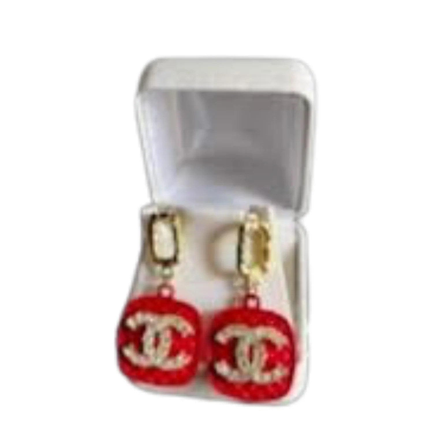 A pair of elegant earrings featuring a stylish CC design in vibrant red and blue colors, perfect for any occasion.