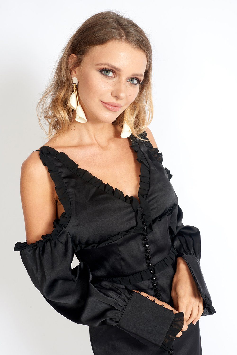 Elegant Night At The Museum Black Satin Dress featuring off-the-shoulder ruffled sleeves and a back slit for ease of movement.