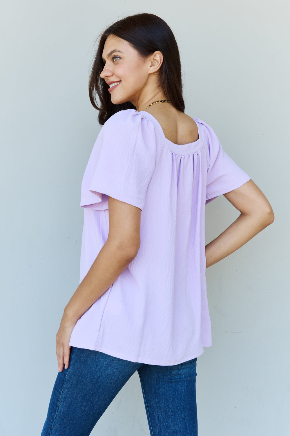 Ninexis Keep Me Close Square Neck Short Sleeve Blouse in Lavender, featuring ruffle neck detailing and short puff sleeves.