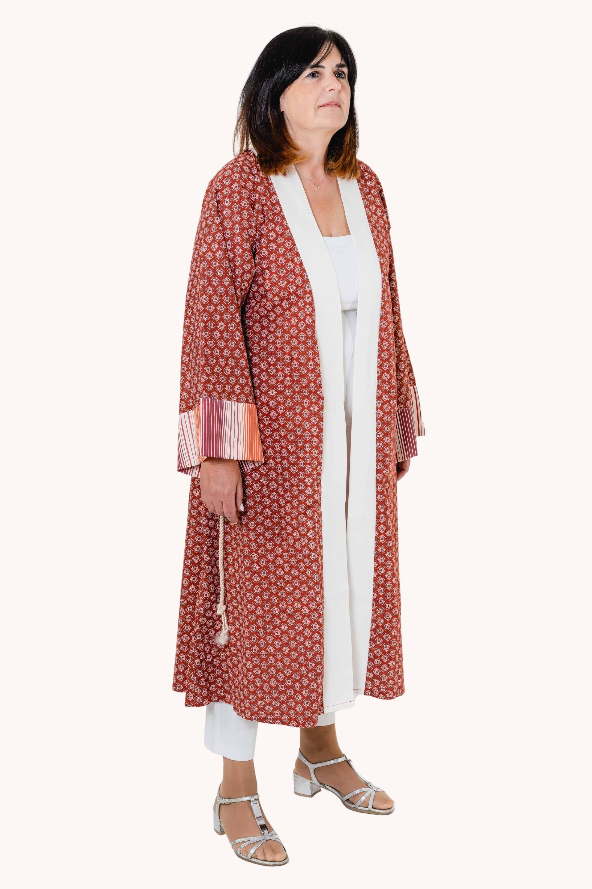 Occidentalis long kimono featuring Asian motifs and striped wrist details, made from jacquard-taffeta fabrics with a cord belt.