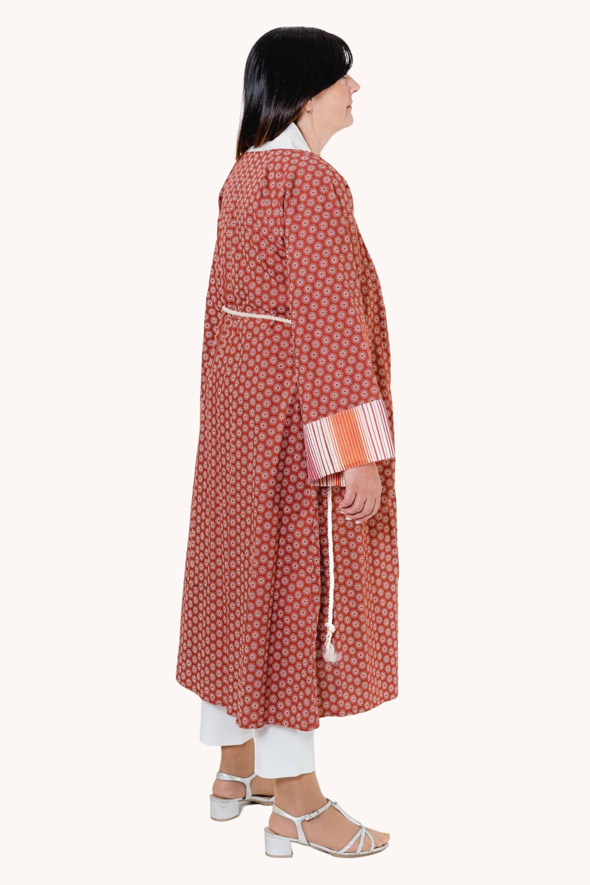 Occidentalis long kimono featuring Asian motifs and striped wrist details, made from jacquard-taffeta fabrics with a cord belt.