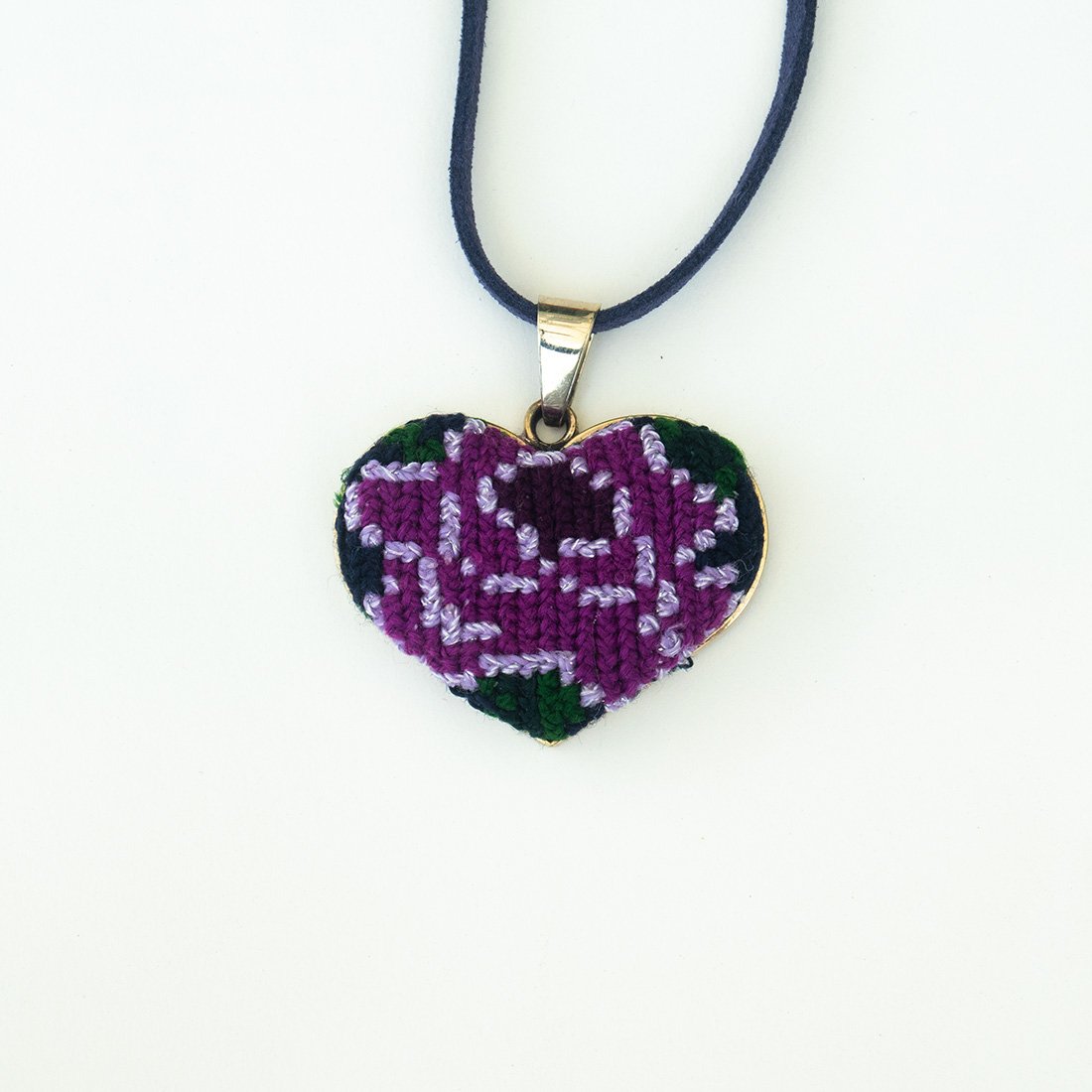 Ocosingo Heart Embroidered Necklace featuring vibrant colors and intricate designs, handcrafted by artisans from Chiapas, Mexico.