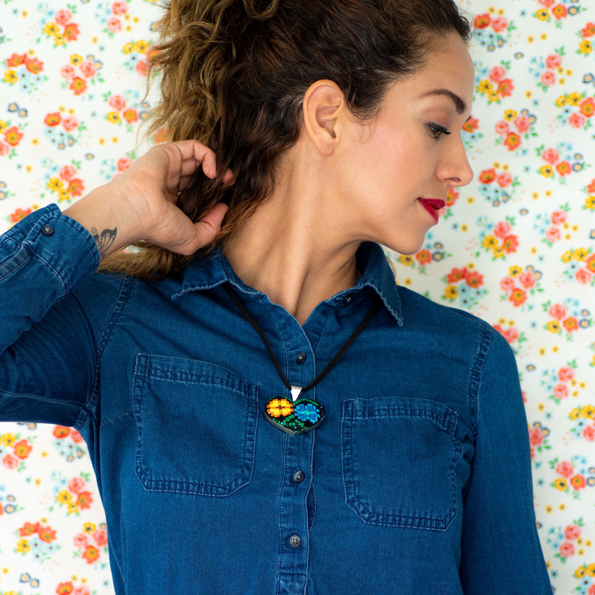 Ocosingo Heart Embroidered Necklace featuring vibrant colors and intricate designs, handcrafted by artisans from Chiapas, Mexico.