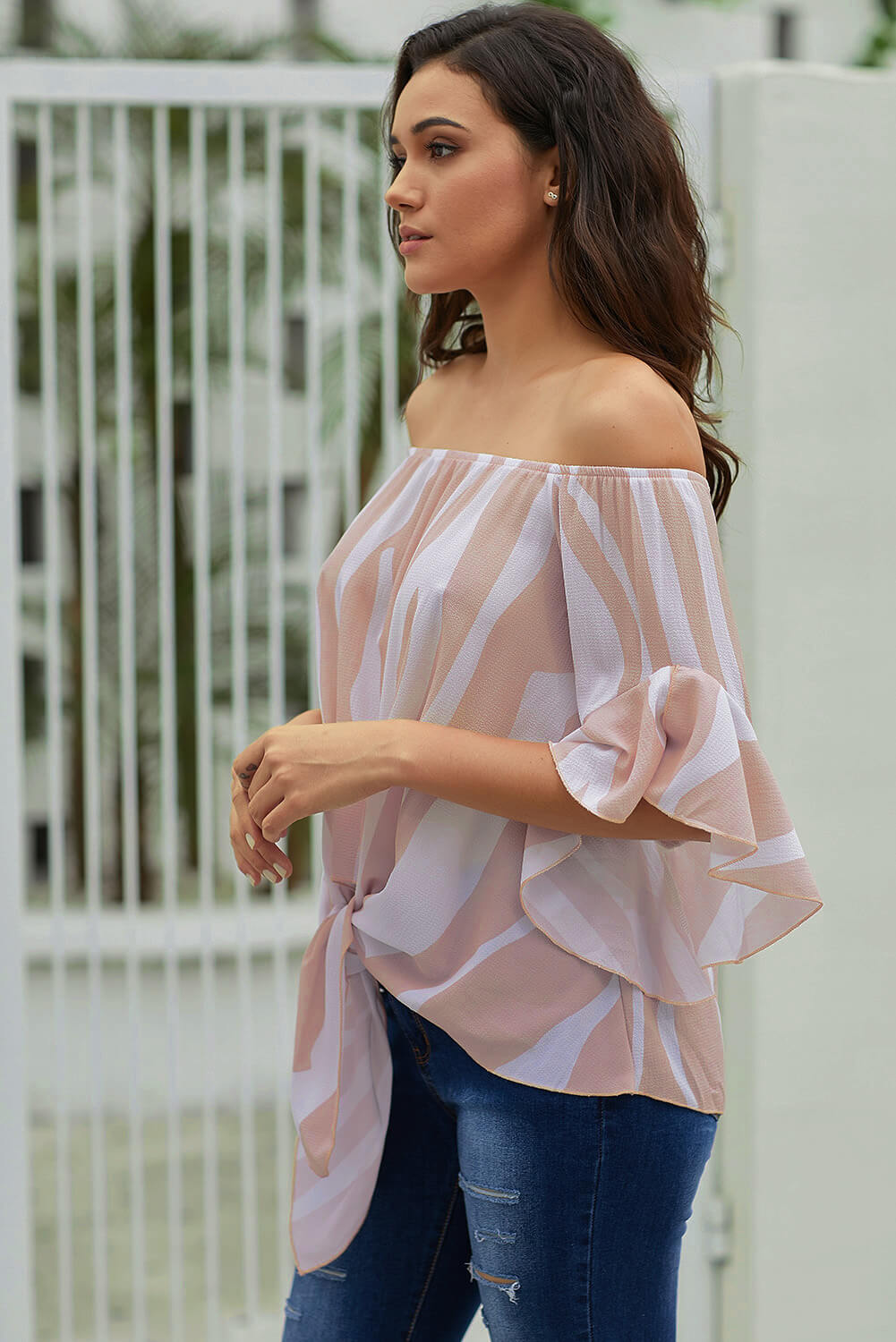 Off The Shoulder Pink White Vertical Stripes Blouse with ruffles and tie front design, perfect for summer wear.