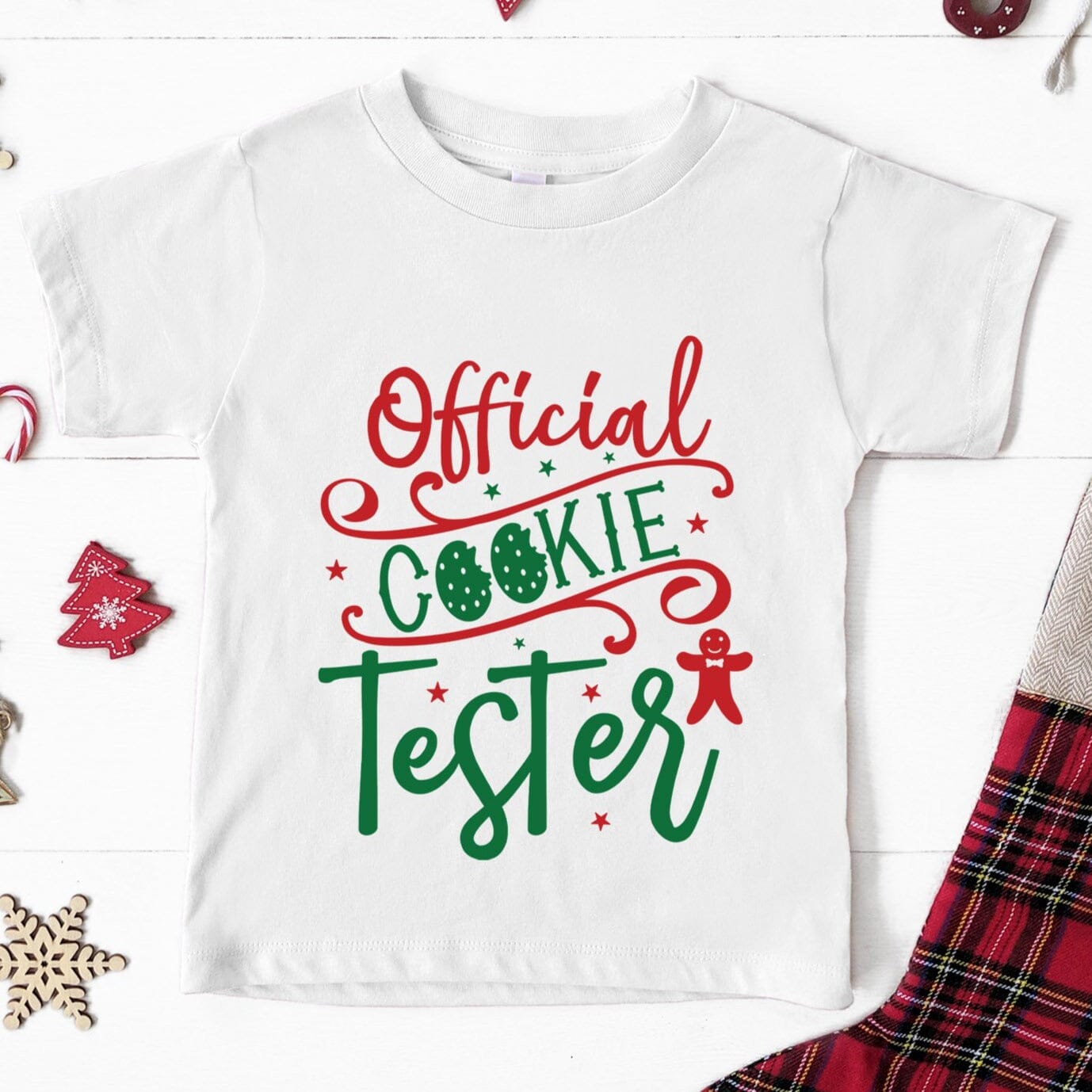 A cute toddler wearing the Official Cookie Tester Tee, showcasing its playful design and comfortable fit.