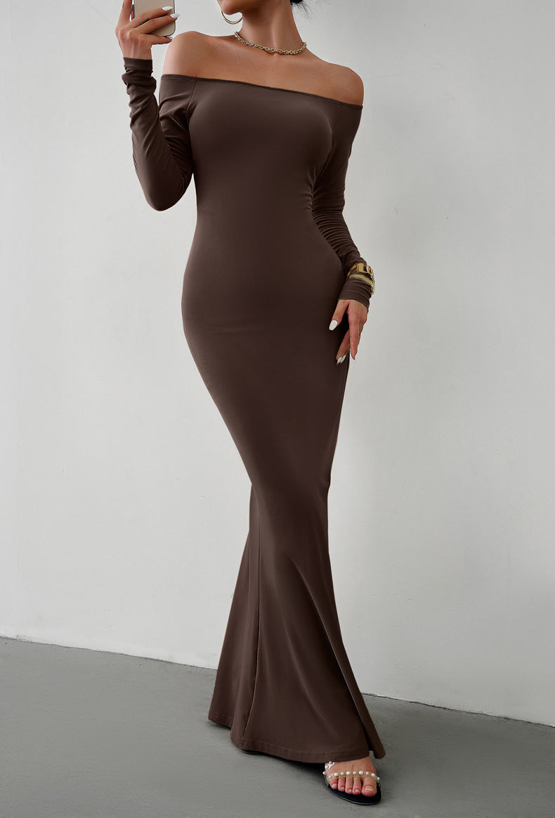 A stylish off-shoulder long sleeve maxi dress in solid color, featuring a mermaid hem and made from a comfortable polyester blend.