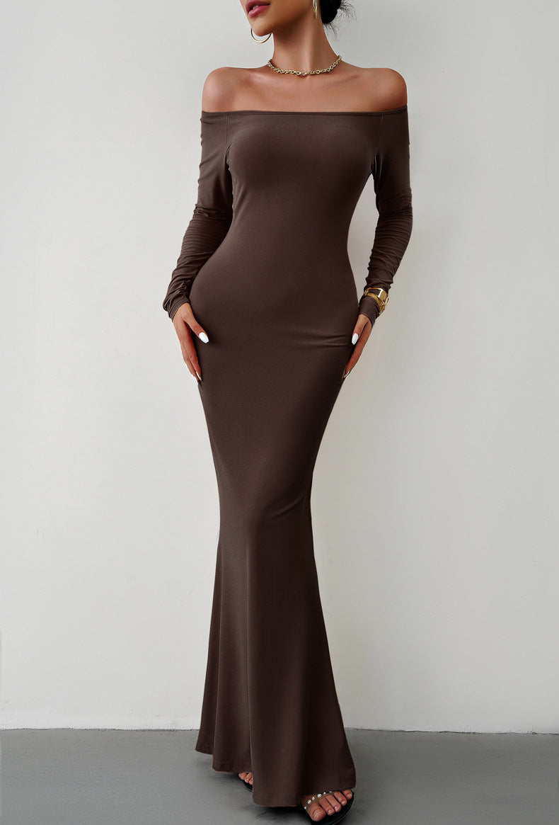 A stylish off-shoulder long sleeve maxi dress in solid color, featuring a mermaid hem and made from a comfortable polyester blend.