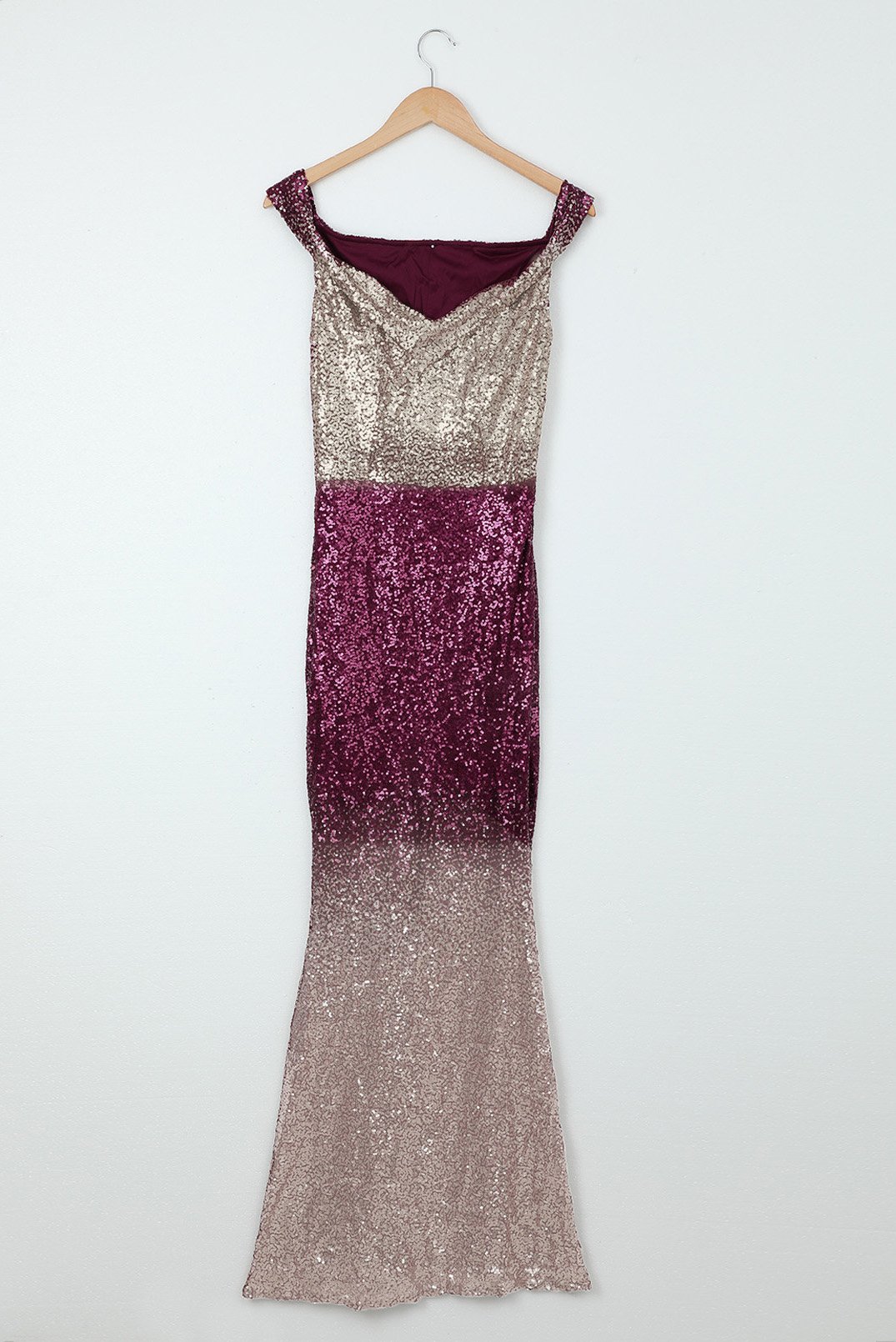 A glamorous off-the-shoulder sequin maxi dress featuring a gradient design, perfect for evening parties and formal events.