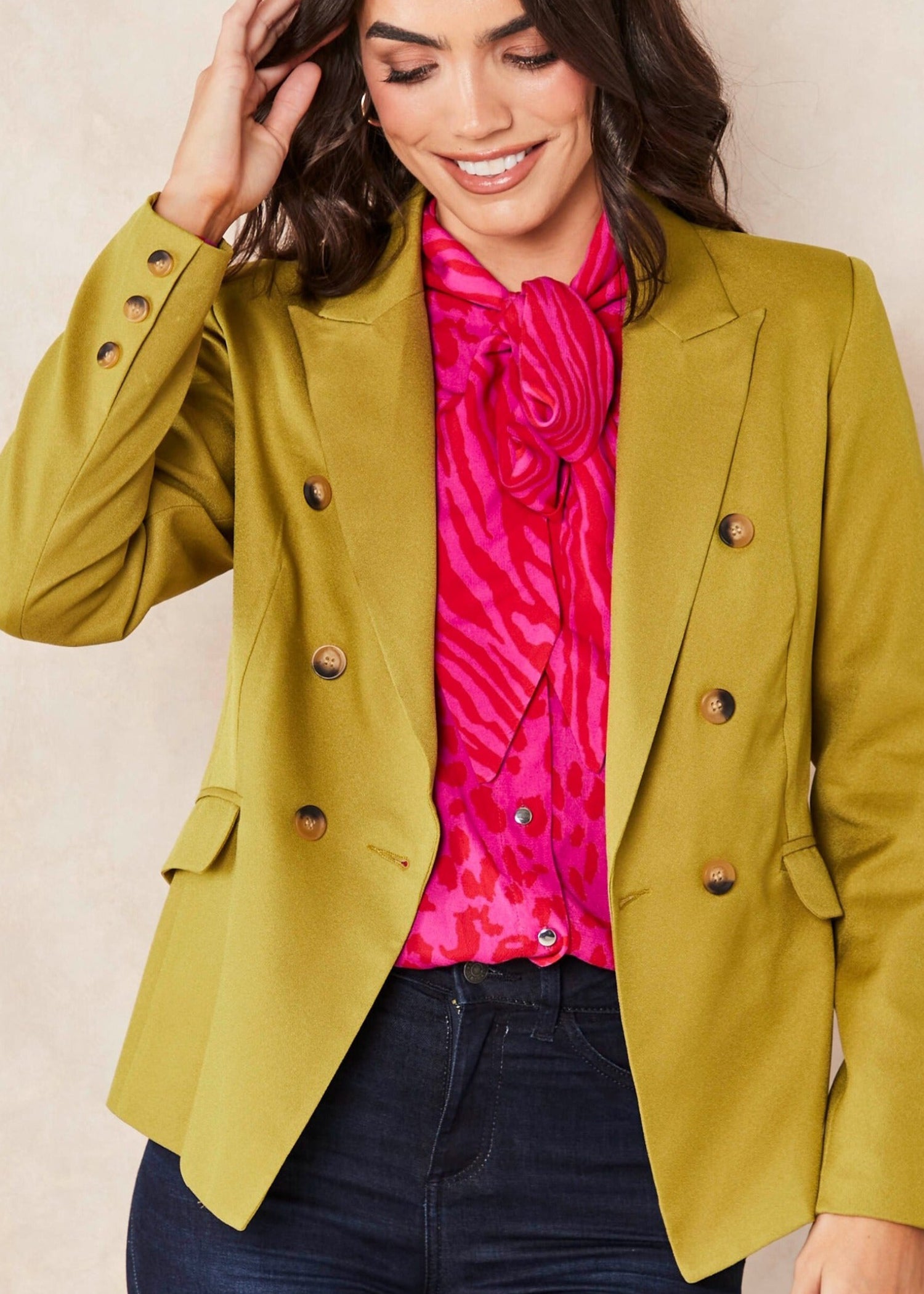 Olive Solid Blazer featuring a double-breasted design and peaked lapel, perfect for office and evening wear.