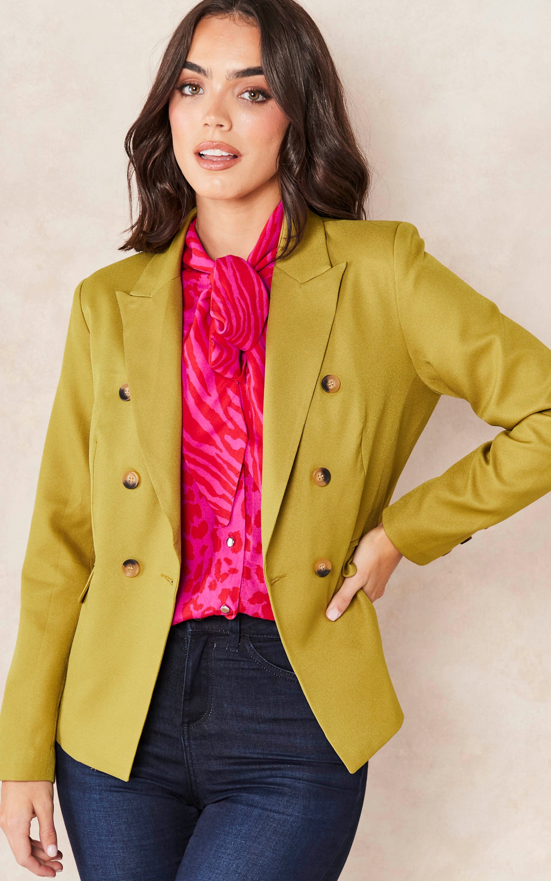 Olive Solid Blazer featuring a double-breasted design and peaked lapel, perfect for office and evening wear.