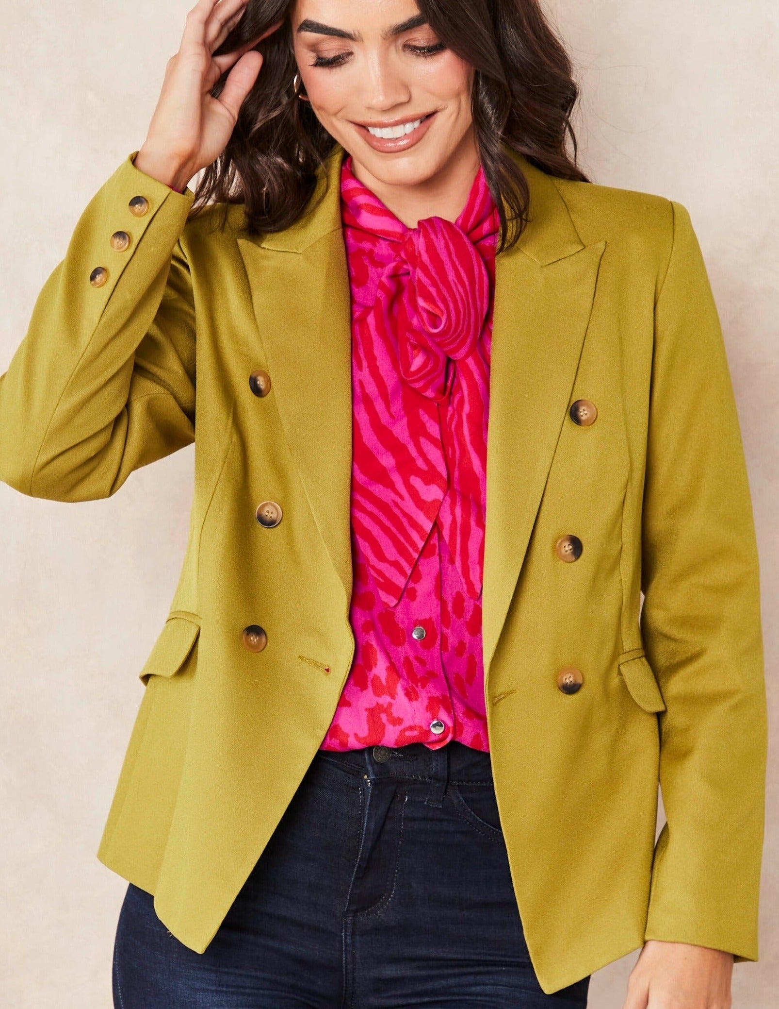 Olive Solid Blazer featuring a double-breasted design and peaked lapel, perfect for office and evening wear.