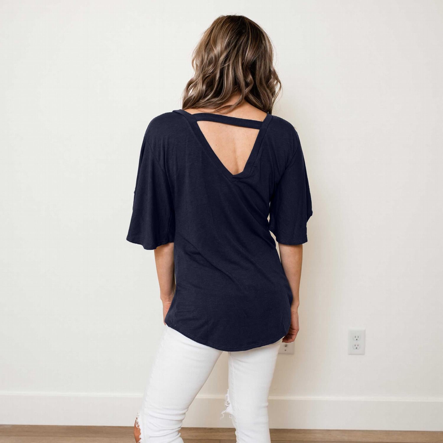 Open Back Tunic Top featuring flutter sleeves and a unique bar back design, perfect for warm weather.