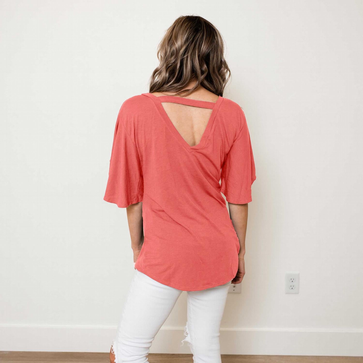 Open Back Tunic Top featuring flutter sleeves and a unique bar back design, perfect for warm weather.