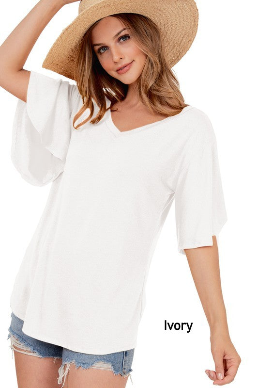 Open Back Tunic Top featuring flutter sleeves and a unique bar back design, perfect for warm weather.