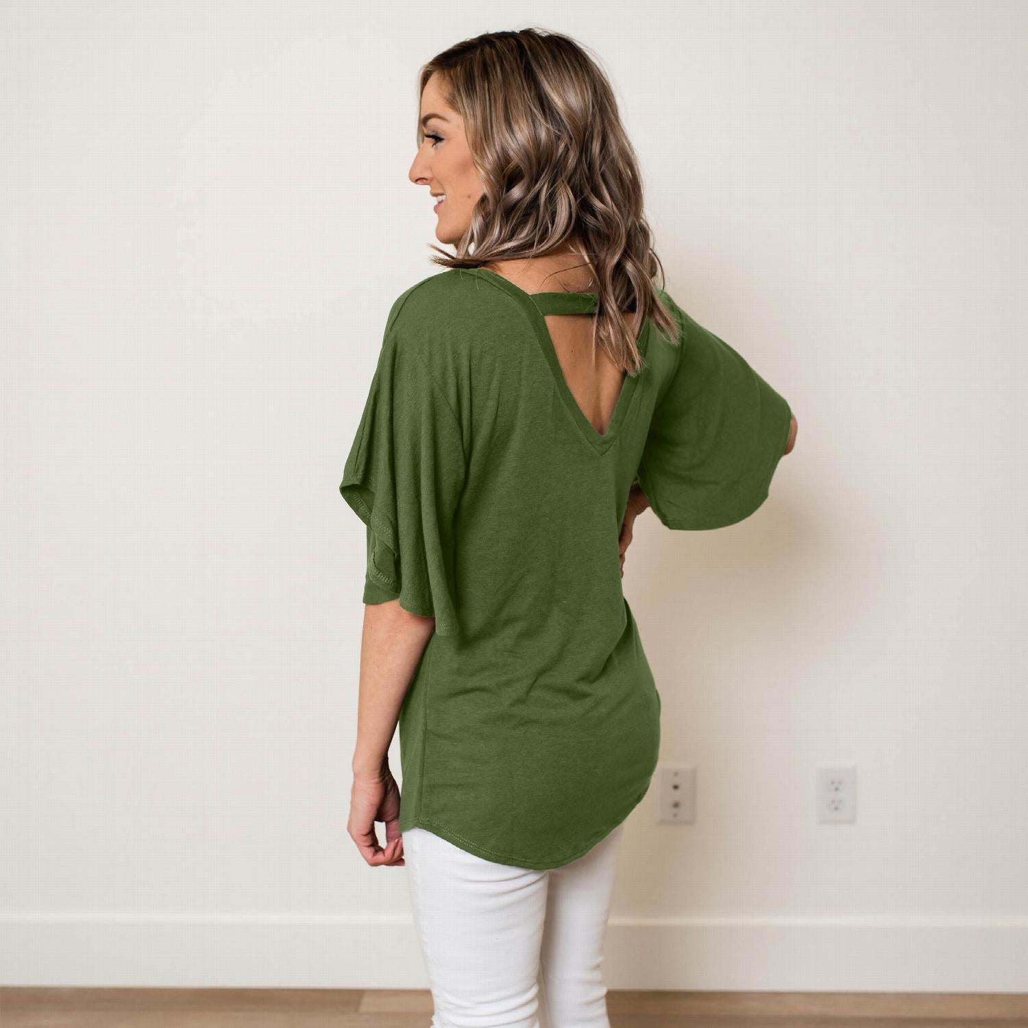 Open Back Tunic Top featuring flutter sleeves and a unique bar back design, perfect for warm weather.