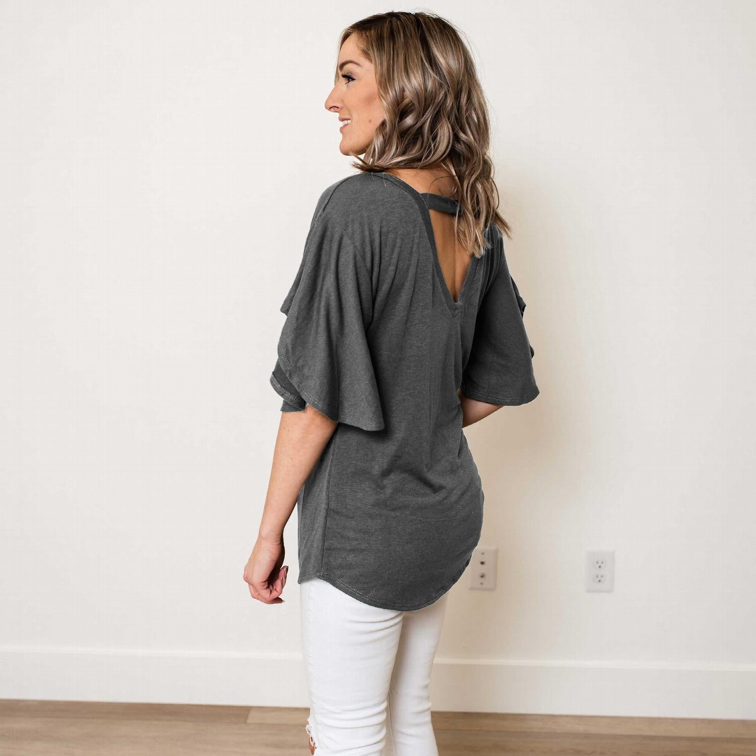 Open Back Tunic Top featuring flutter sleeves and a unique bar back design, perfect for warm weather.