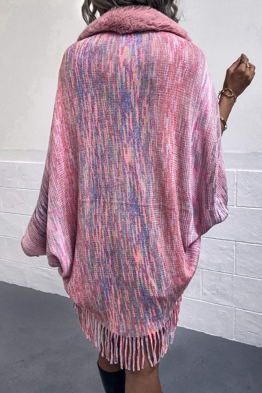 Open Front Fringe Hem Poncho featuring a stylish design with fringe detailing, made from 100% polyester, perfect for layering.