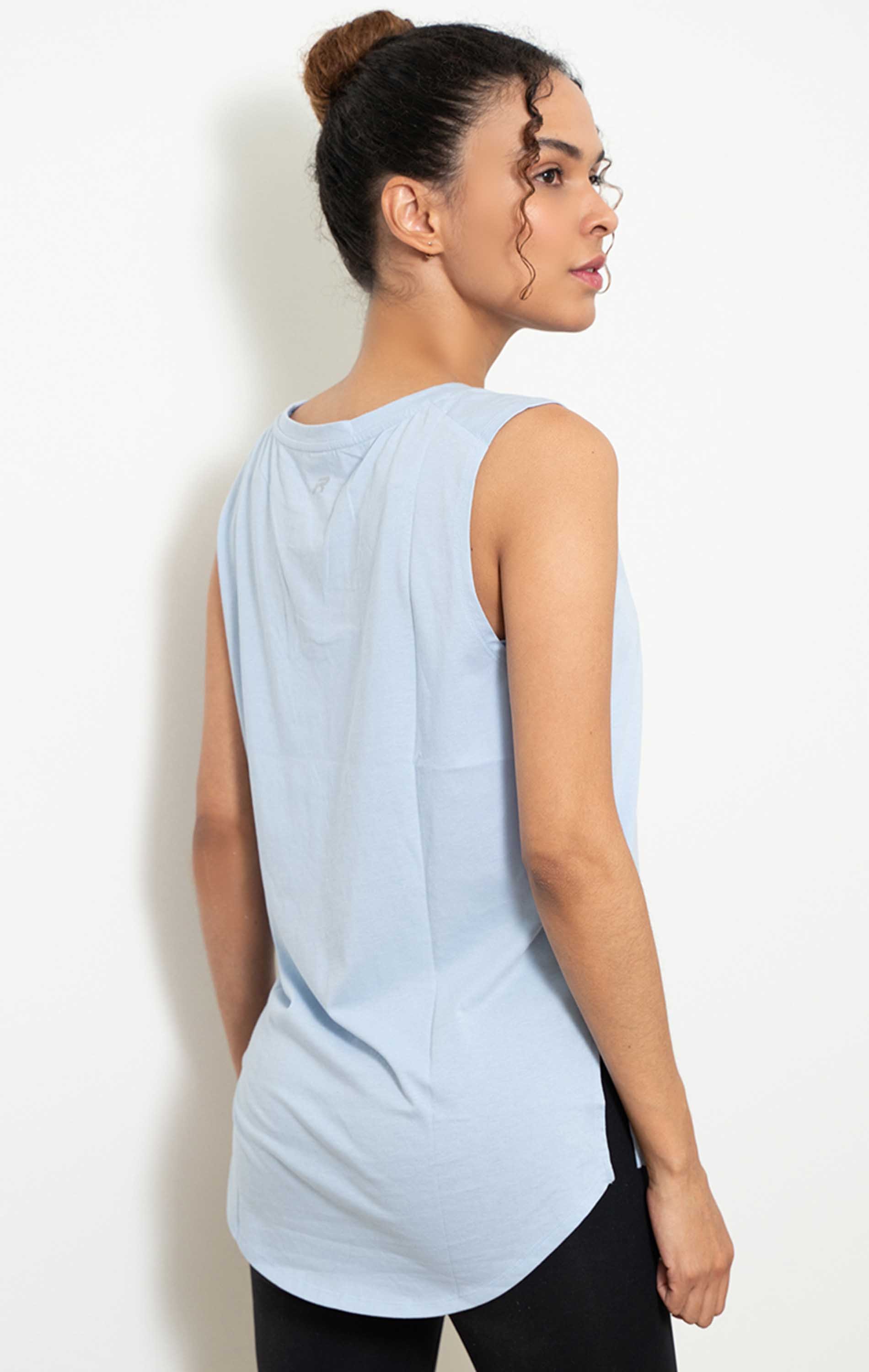 Orchid Muscle Tank Top in Baby Blue, featuring a boxy fit and oversized armholes for breathability, perfect for workouts and casual wear.