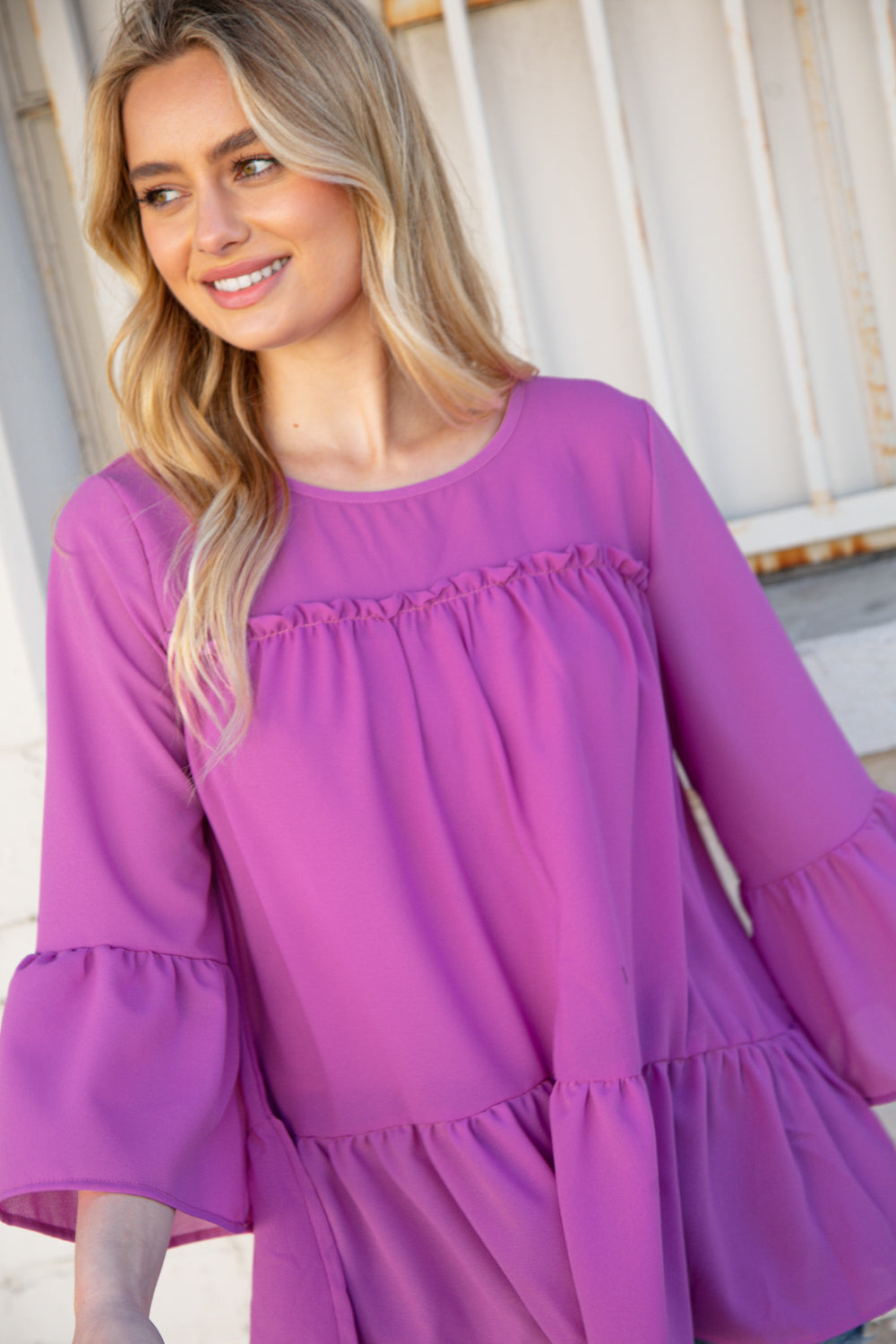 Orchid Round Neck Frill Detail Crepe Blouse featuring a frill yoke and bell sleeves, perfect for stylish outings.