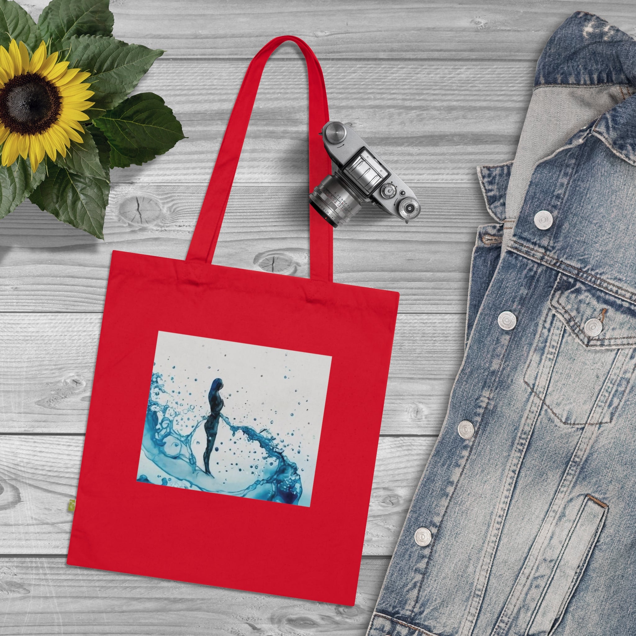 A stylish Organic Cotton Tote Bag made from durable 100% organic cotton canvas, featuring a long handle and spacious design.