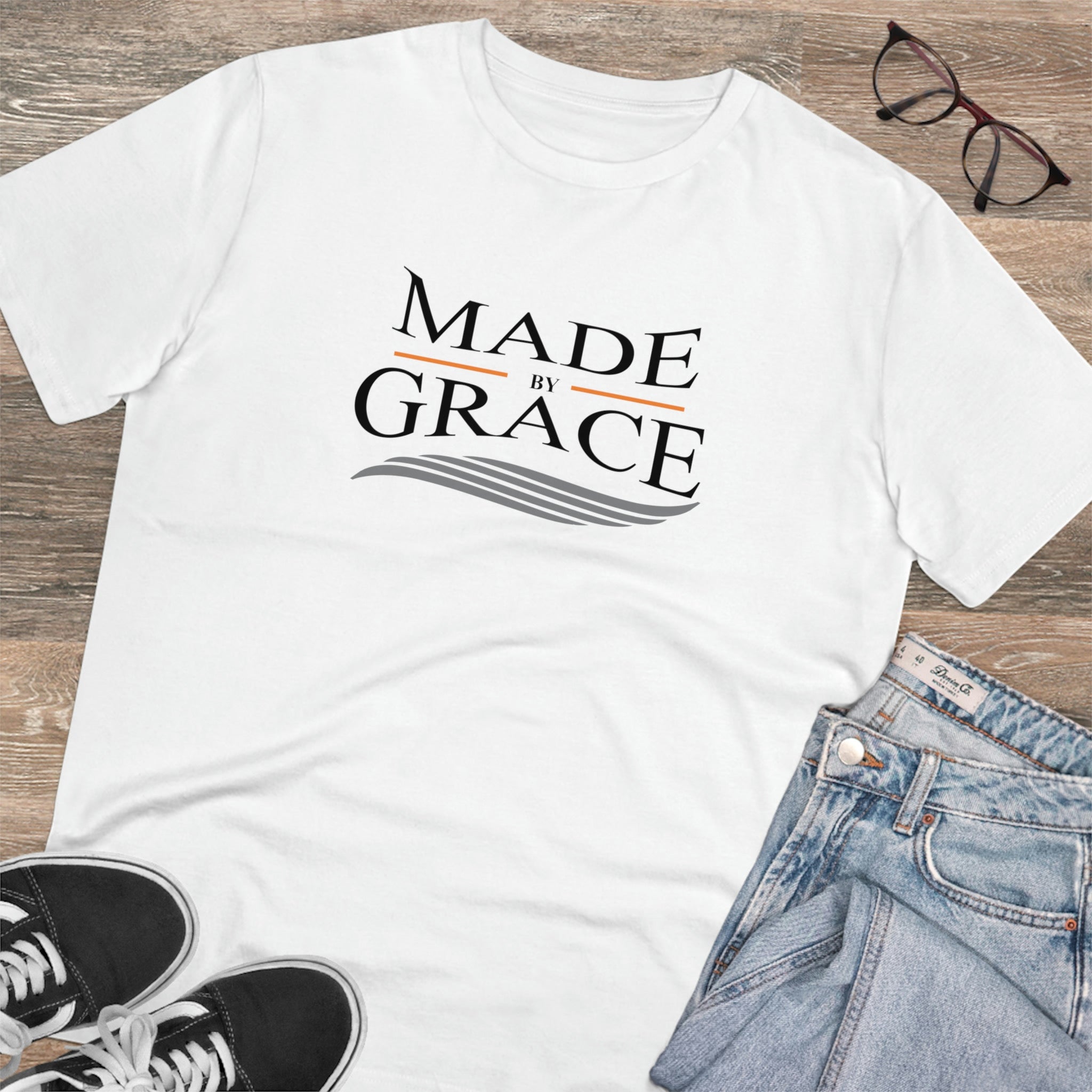 Organic Made By Grace T-shirt made from 100% organic cotton, featuring a ribbed neck collar and hemmed sleeves, available in various sizes.