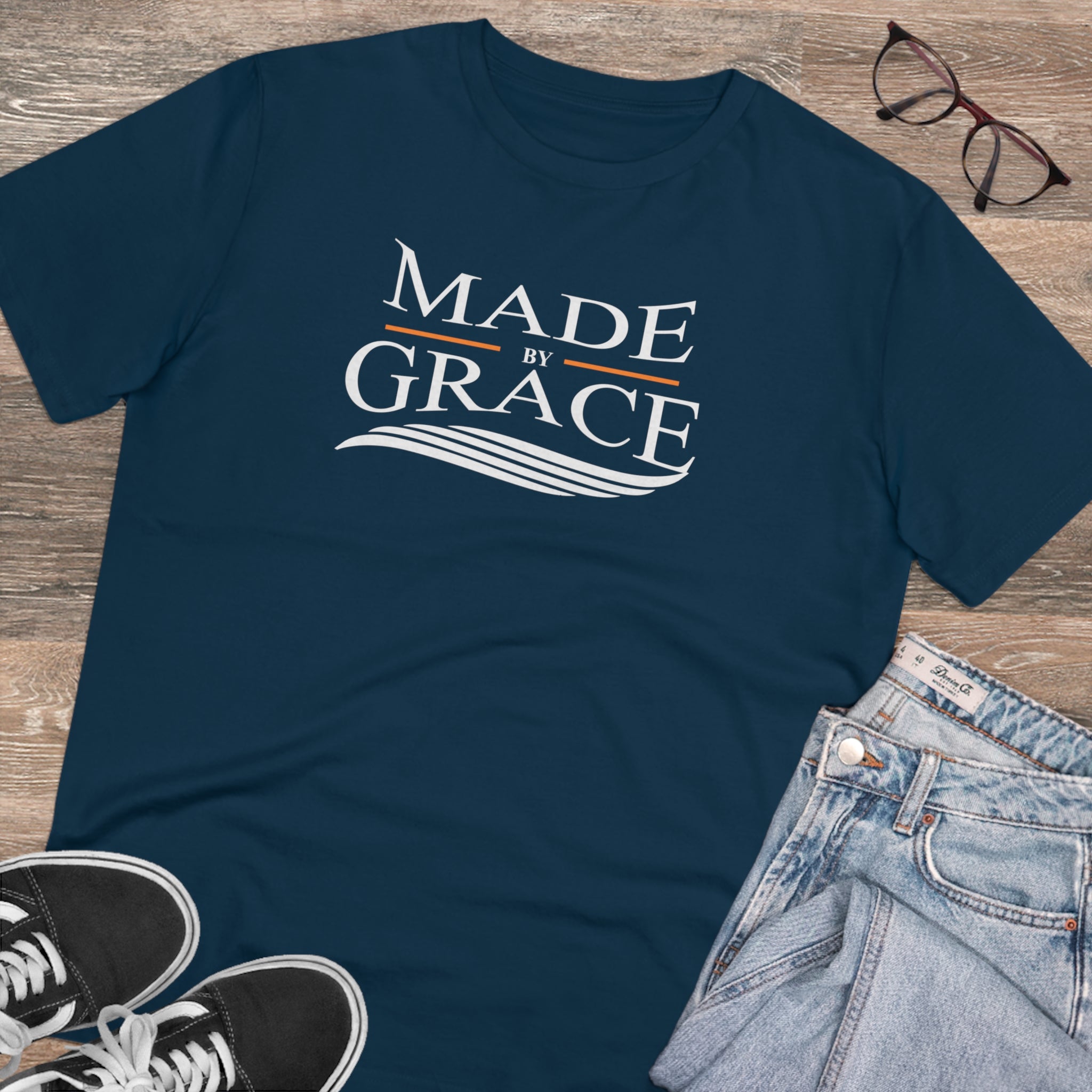 Organic Made By Grace T-shirt made from 100% organic cotton, featuring a ribbed neck collar and hemmed sleeves, available in various sizes.