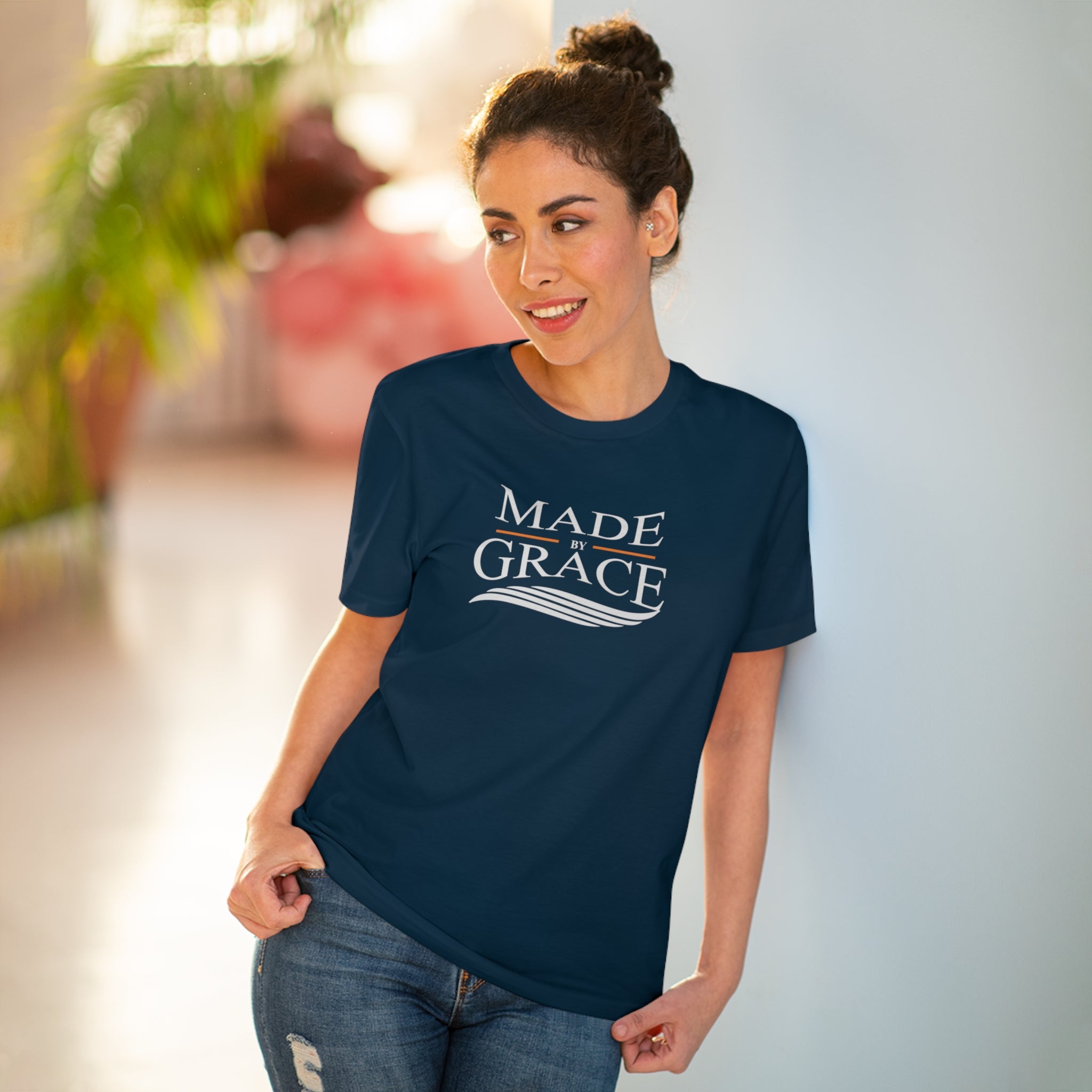 Organic Made By Grace T-shirt made from 100% organic cotton, featuring a ribbed neck collar and hemmed sleeves, available in various sizes.