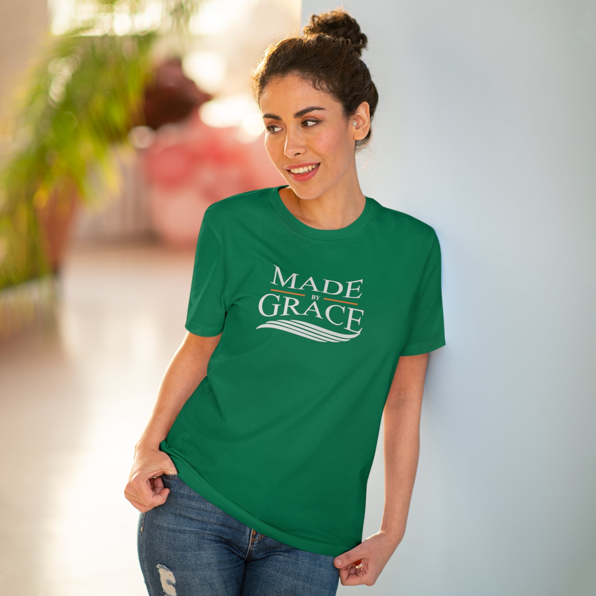 Organic Made By Grace T-shirt made from 100% organic cotton, featuring a ribbed neck collar and hemmed sleeves, available in various sizes.