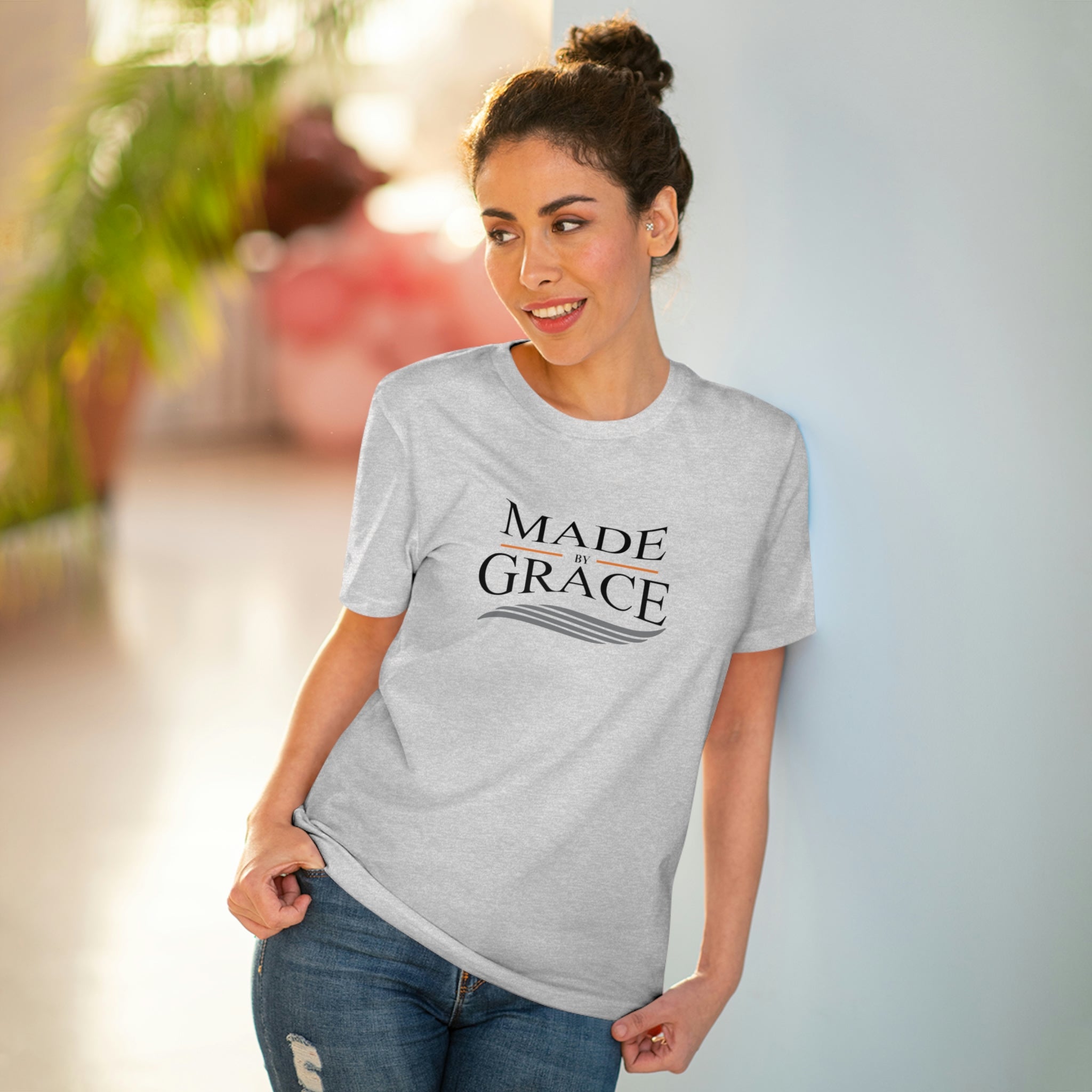 Organic Made By Grace T-shirt made from 100% organic cotton, featuring a ribbed neck collar and hemmed sleeves, available in various sizes.