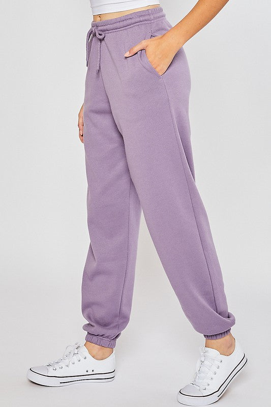 A pair of soft and smooth oversized sweatpants in a relaxed fit, perfect for lounging or casual outings.