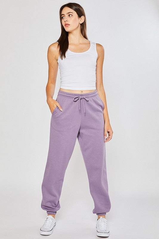 A pair of soft and smooth oversized sweatpants in a relaxed fit, perfect for lounging or casual outings.