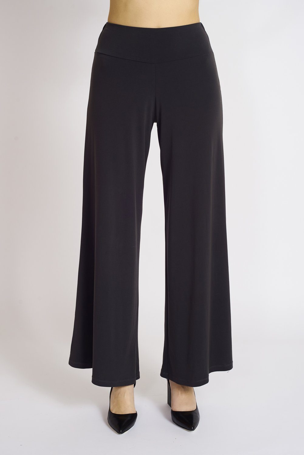 A pair of elegant Signature Palazzo Pants with a wide band elastic waist, showcasing a flattering drape and stylish design, perfect for various occasions.