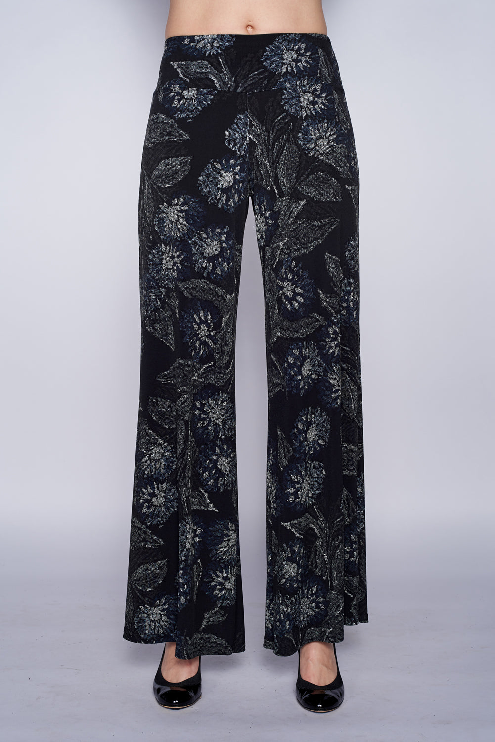 A pair of elegant Signature Palazzo Pants with a wide band elastic waist, showcasing a flattering drape and stylish design, perfect for various occasions.