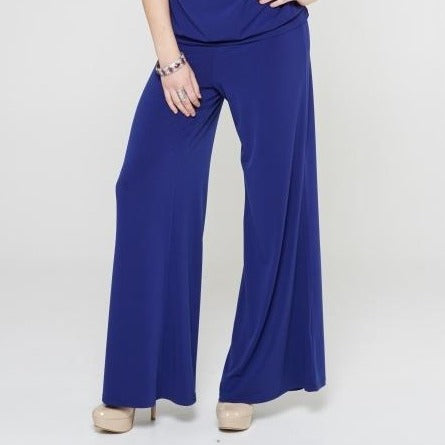 A pair of elegant Signature Palazzo Pants with a wide band elastic waist, showcasing a flattering drape and stylish design, perfect for various occasions.