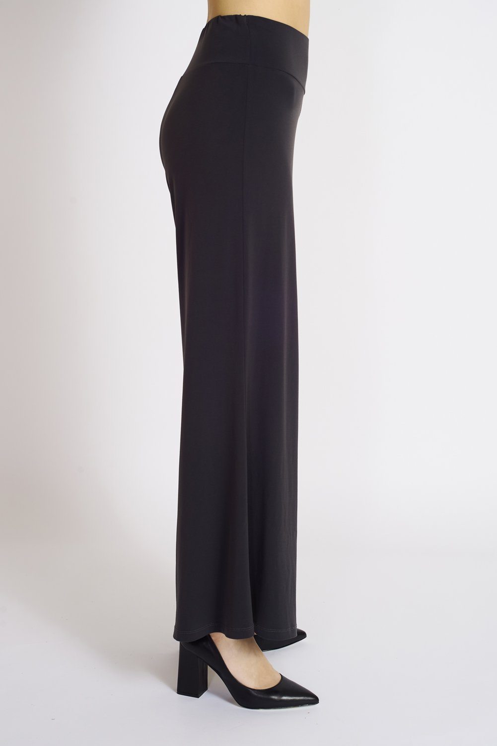 A pair of elegant Signature Palazzo Pants with a wide band elastic waist, showcasing a flattering drape and stylish design, perfect for various occasions.