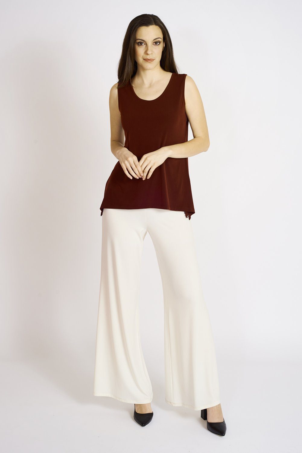 A pair of elegant Signature Palazzo Pants with a wide band elastic waist, showcasing a flattering drape and stylish design, perfect for various occasions.