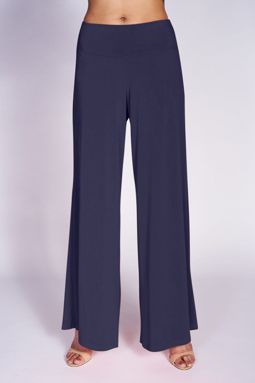 A pair of elegant Signature Palazzo Pants with a wide band elastic waist, showcasing a flattering drape and stylish design, perfect for various occasions.