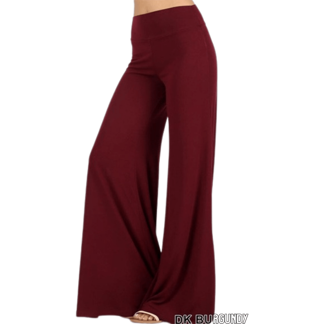 A pair of elegant Signature Palazzo Pants with a wide band elastic waist, showcasing a flattering drape and stylish design, perfect for various occasions.