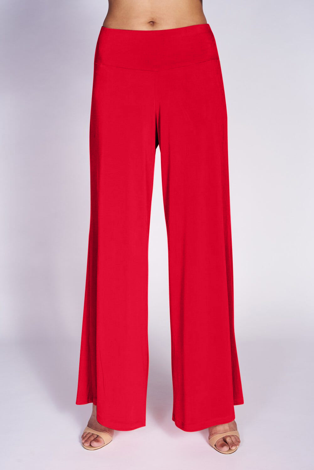 A pair of elegant Signature Palazzo Pants with a wide band elastic waist, showcasing a flattering drape and stylish design, perfect for various occasions.