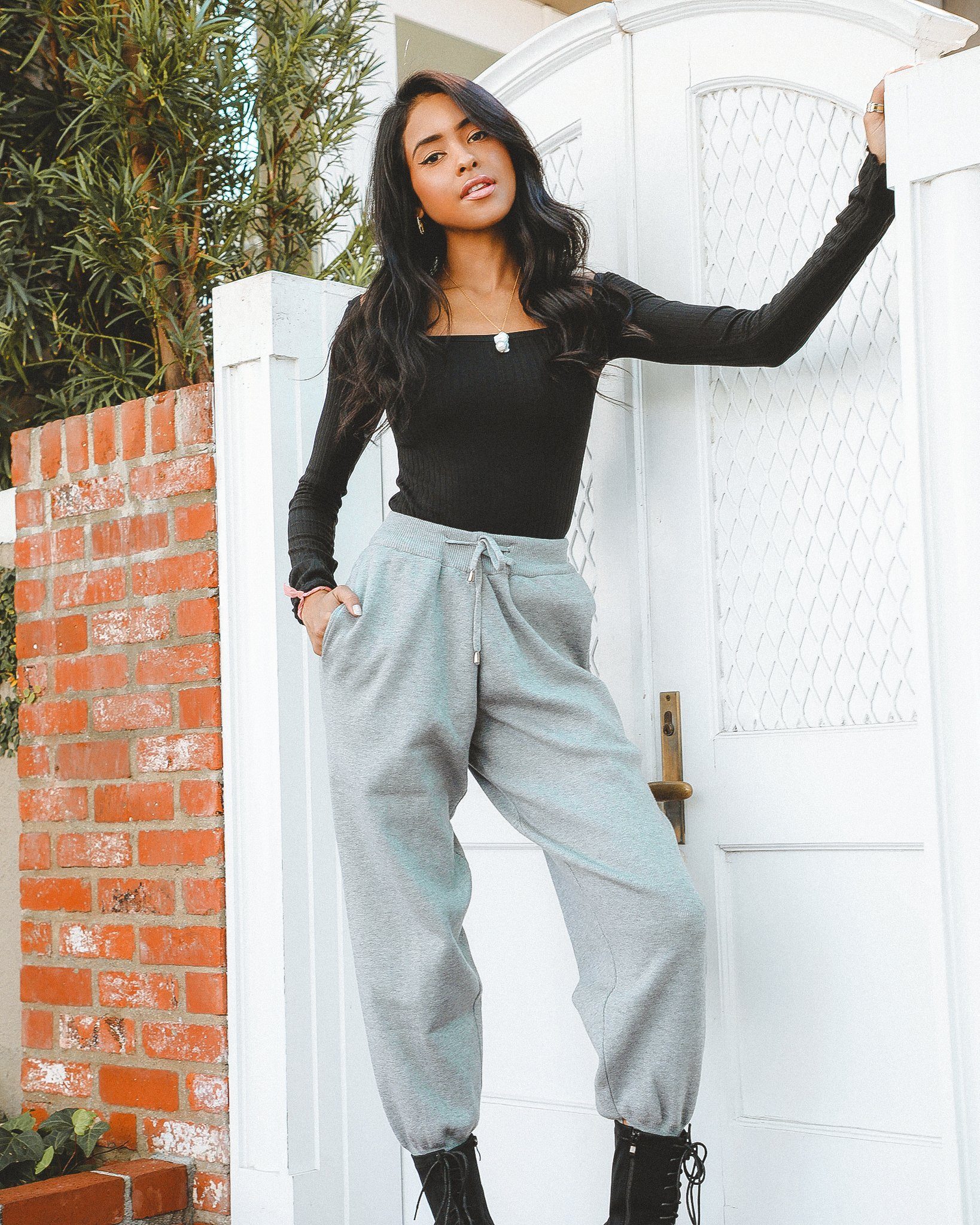 Paloma Tapered Joggers showcasing a relaxed fit, drawstring waist, and stylish side slits, perfect for casual chic outfits.