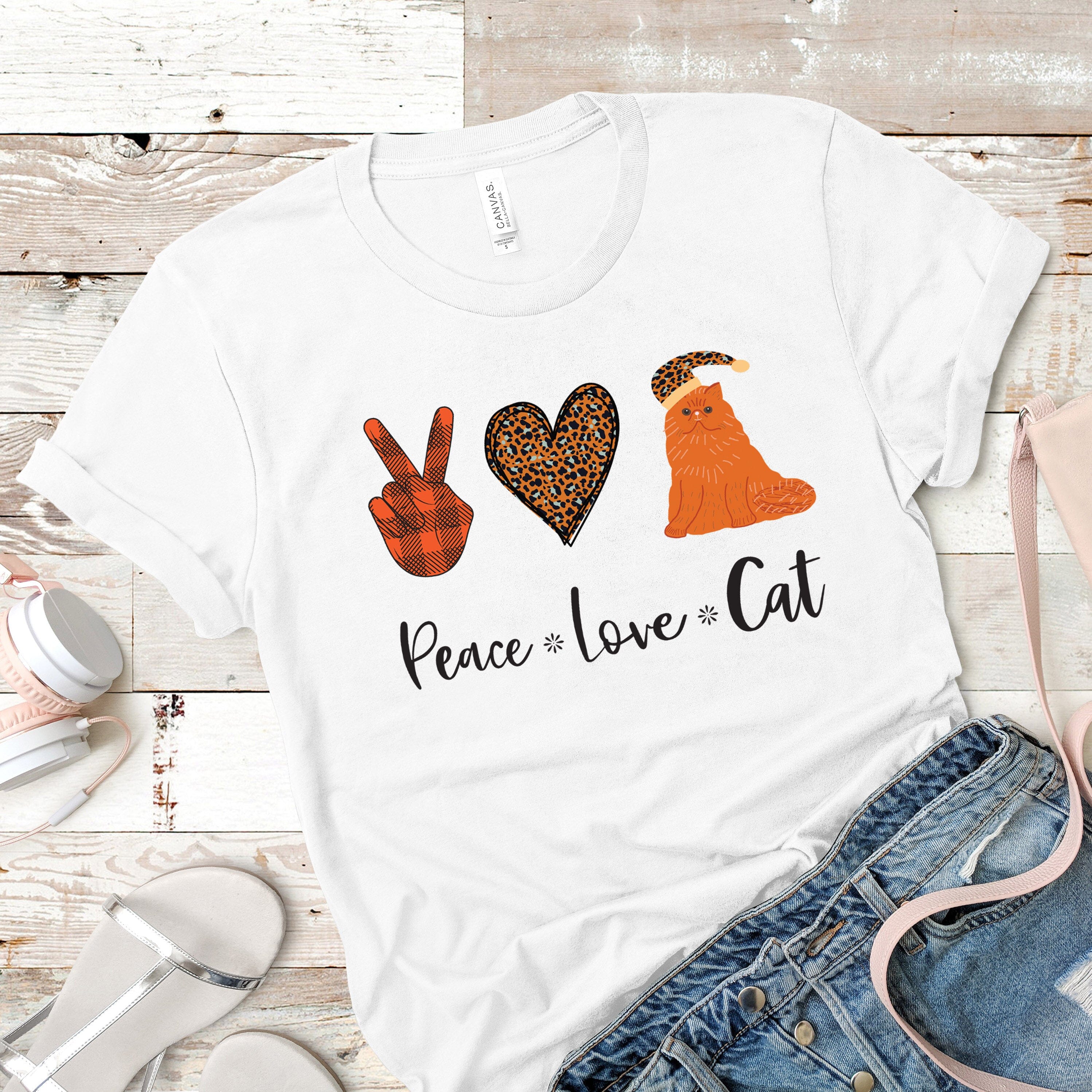 A stylish Peace, Love, Cat Tee featuring a cute cat design, made from soft Ringspun Cotton, perfect for casual wear.