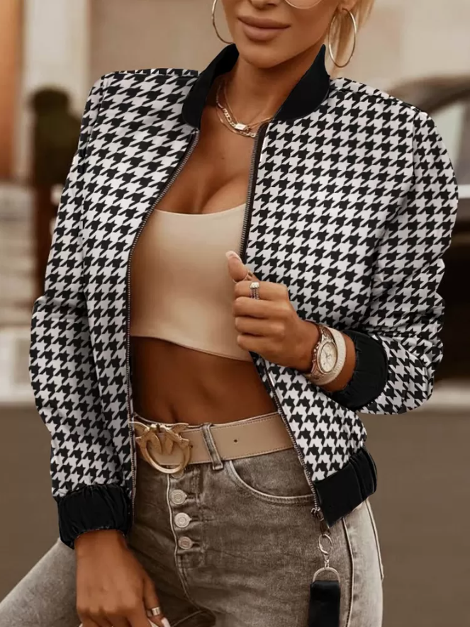 Black and white pepita print bomber jacket with stand-up collar and metal zipper, showcasing stylish design and comfortable fabric.