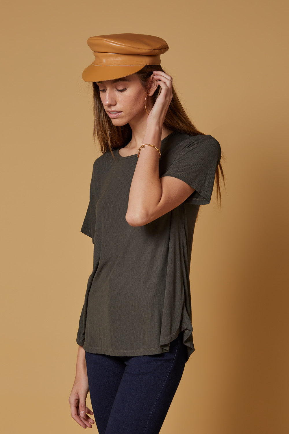 A pair of Perfect Fit Raw Hem Skinnies in deep indigo, featuring a high-rise slim-straight fit and unique raw hem detailing.