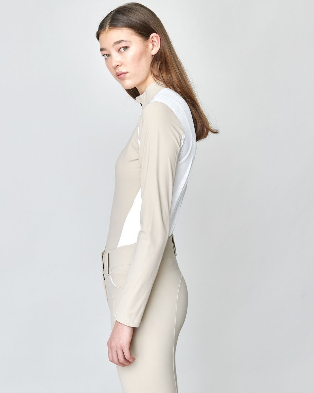 Performance Sun Shirt Tan featuring mesh details for breathability and UV protection, designed for outdoor activities.