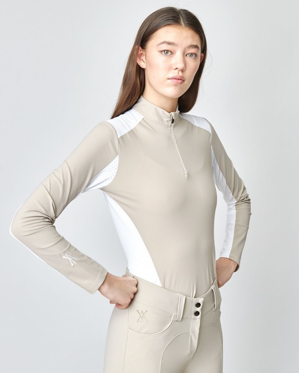 Performance Sun Shirt Tan featuring mesh details for breathability and UV protection, designed for outdoor activities.